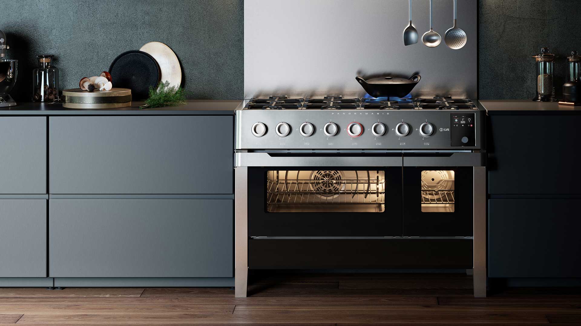 Primo piano di un maestoso blocco cottura o elettrodomestico da incasso a marchio Ilve in acciaio e dettagli di pregio, inserito in una cucina elegante e pronto per l'intervento tecnico a Conegliano